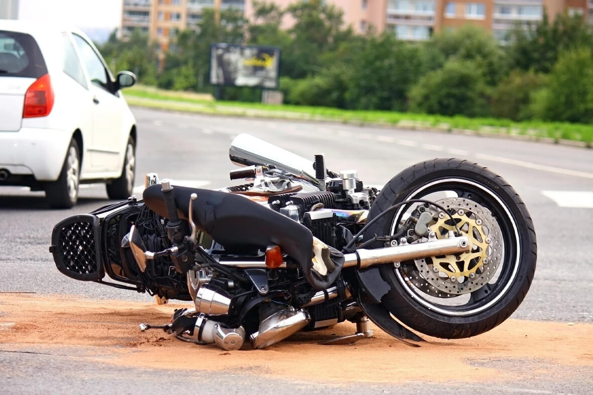Professional legal team investigating a motorcycle accident scene in St. Louis, MO.